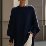 Ausra – poncho de punto elegante