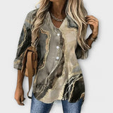 Filine - Elegancia y singularidad en blusa femenina
