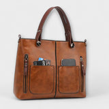 Lora. - Elegante bolso de cuero
