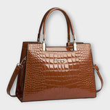 Lora. - Bolso de charol de piel de cocodrilo