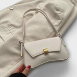 Lora. - Bolso de mano vintage plegable