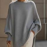 Ausra – poncho de punto elegante