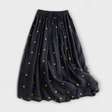 Falda de algodón y lino con estampado de lunares