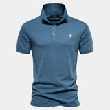 Mathias™ | Polo de Escudo Real