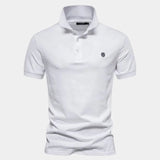 Mathias™ | Polo de Escudo Real