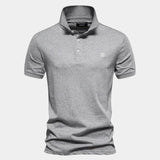 Mathias™ | Polo de Escudo Real