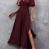 Eterna | Elegante Vestido Maxi Negro con Escote en V, Mangas Anchas y Corte Lateral