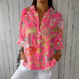 Jeanne | Blusa tropical con coloridos patrones florales