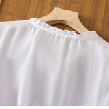 Kissina | Blusa de algodón y lino bordada
