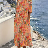 Emma | Vestido midi floral suelto y ligero