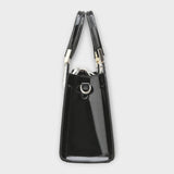 Lora. - Bolso de charol de piel de cocodrilo