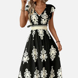 Candela - Vestido maxi barroco con escote en V