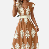 Candela - Vestido maxi barroco con escote en V