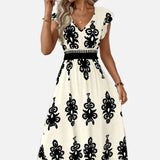Candela - Vestido maxi barroco con escote en V