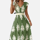 Candela - Vestido maxi barroco con escote en V
