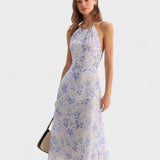 Clarice | Vestido midi azul con estampado floral y escote halter