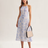 Clarice | Vestido midi azul con estampado floral y escote halter